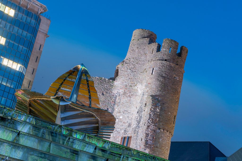 Swansea Castle and fountain by night